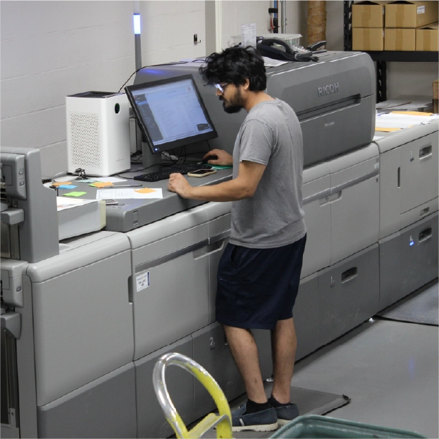 Digital print operator at production printer